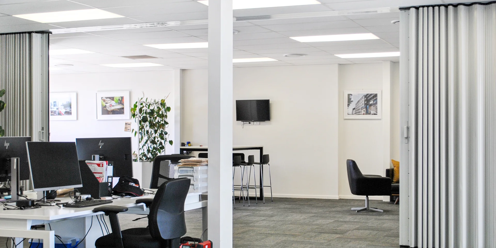 DuraSound acoustic accordion partition dividing open plan office workspaces