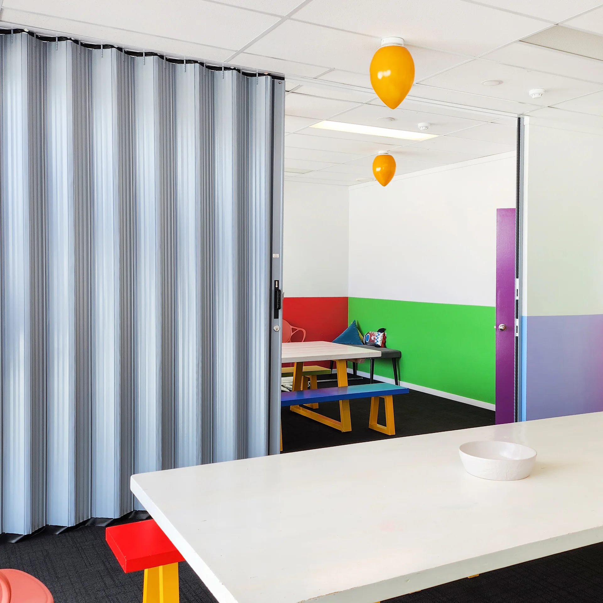DuraFlex accordion partition in kids play centre creating flexible play and learning spaces