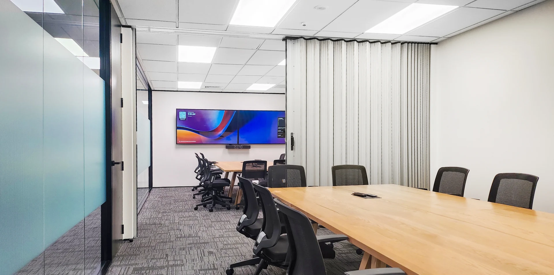 DuraSound acoustic accordion partition dividing office boardroom and meeting spaces