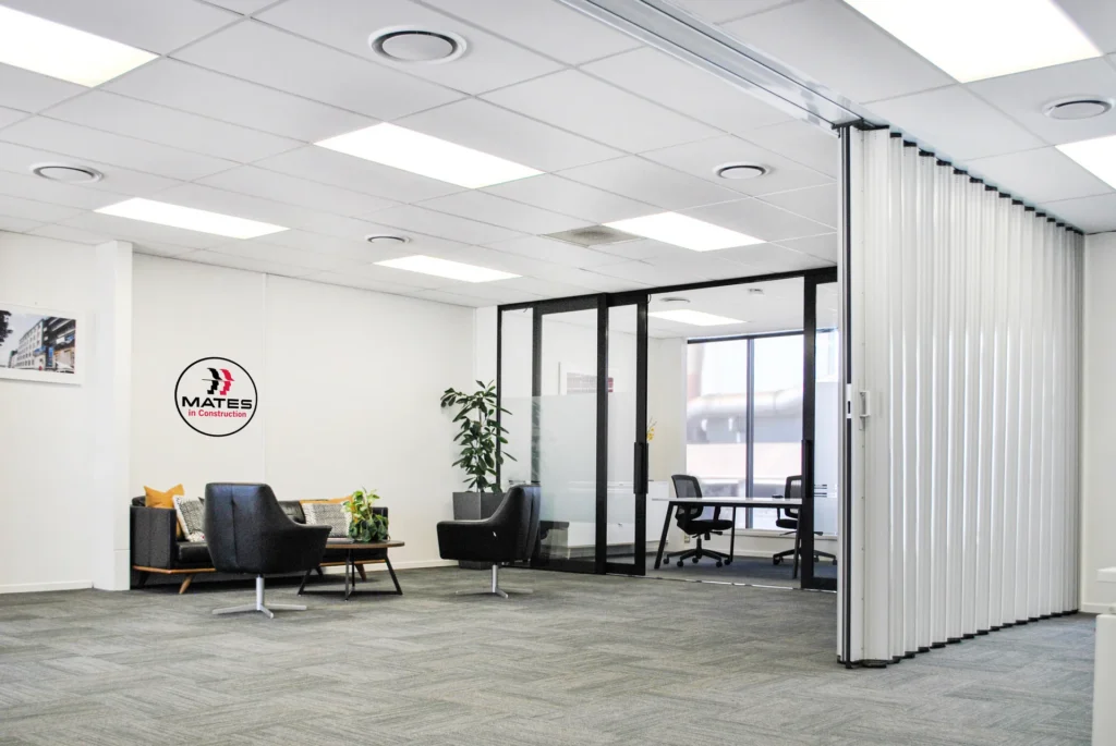 DuraSound acoustic accordion partition dividing open plan office workspaces