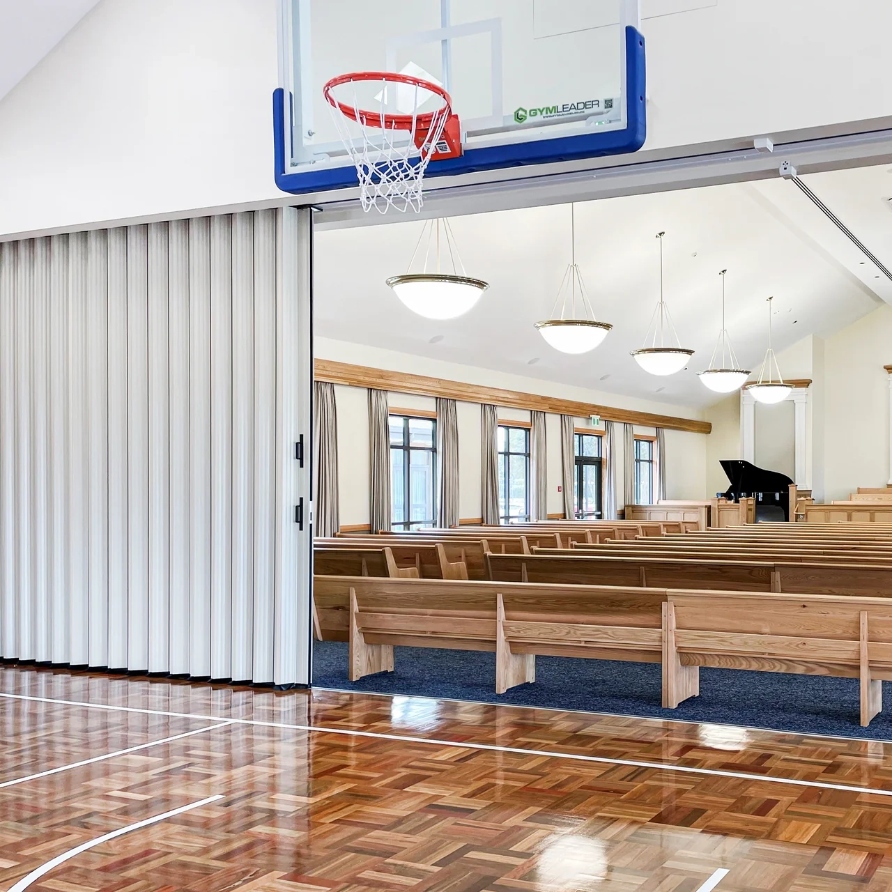 DuraSound acoustic accordion partition dividing a church hall and worship space