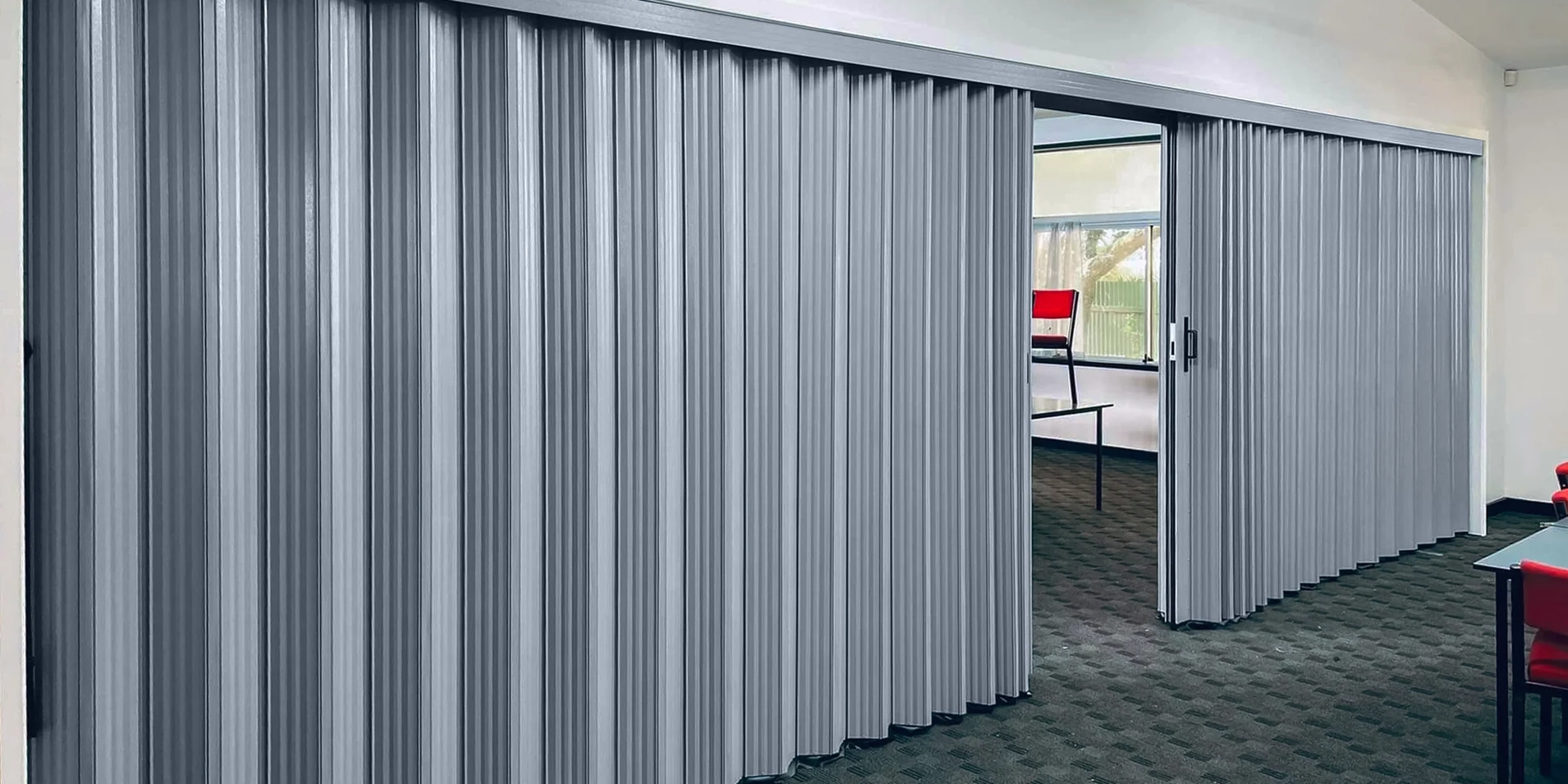 DuraSound accordion door system creating flexible learning environments