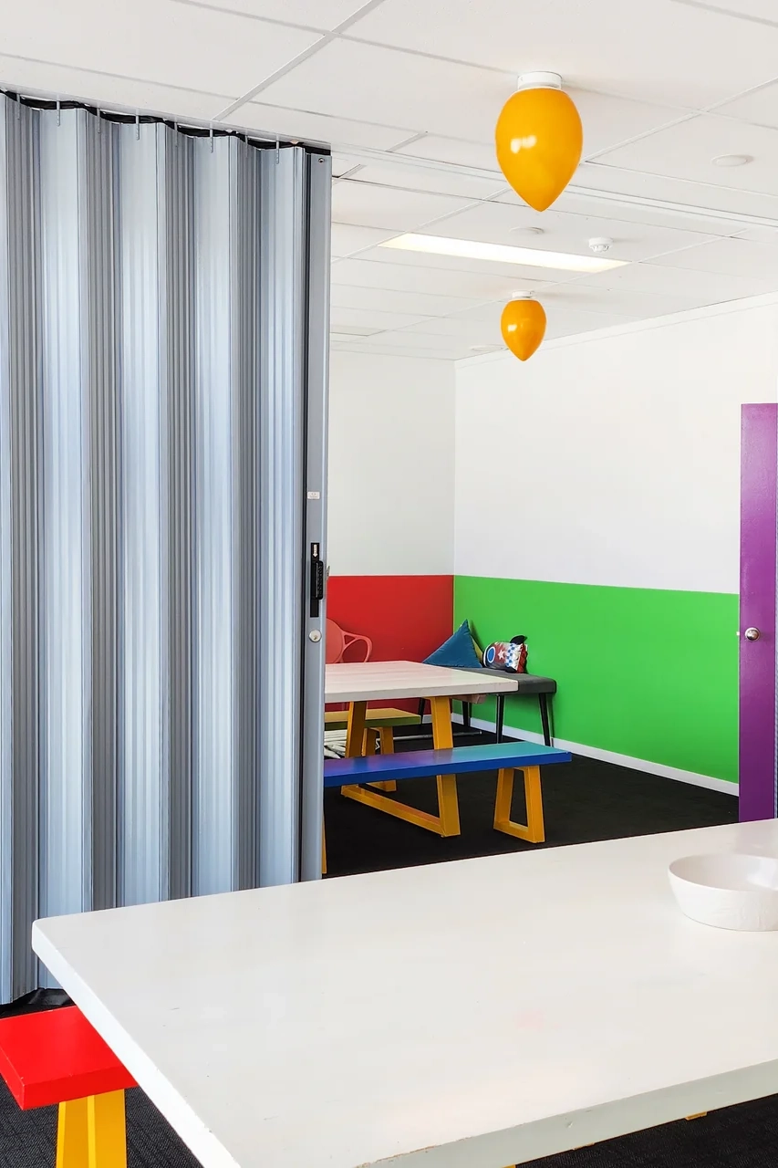 DuraFlex accordion partition in childcare centre dividing indoor play area